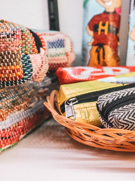 Various bags in a basket, labeled with prices. | © Janet Newenham - Journalist On The Run