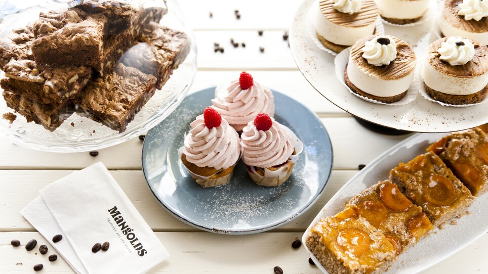 Leckere Desserts im Restaurant Mangolds: Cupcakes, Cheesecakes, Brownies und Marillenkuchen. | © Mangolds
