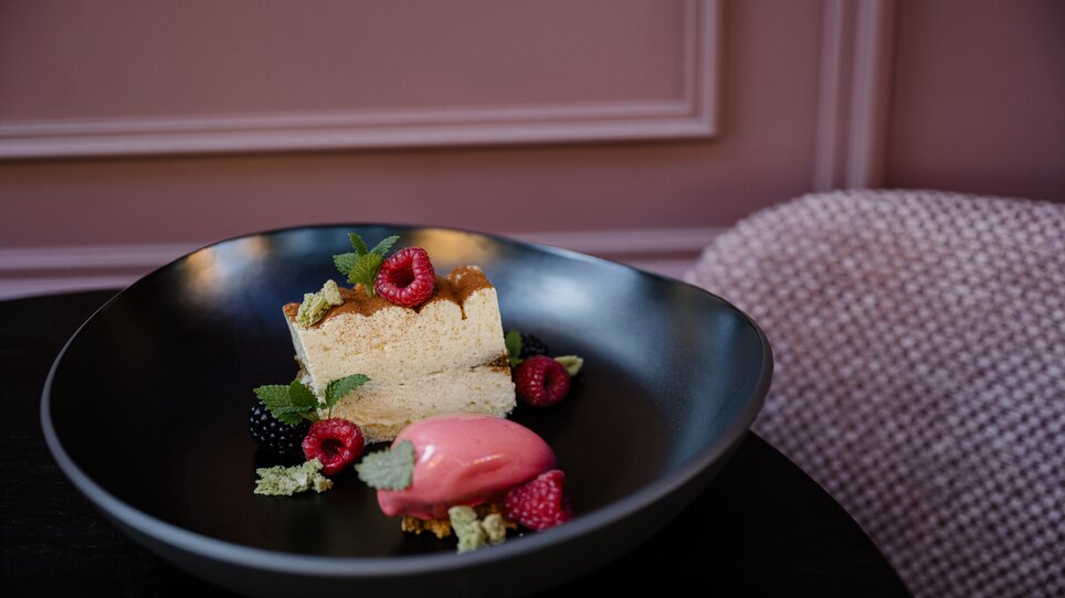 A beautifully arranged dessert featuring cake and sorbet. | © Joel Kernasenko
