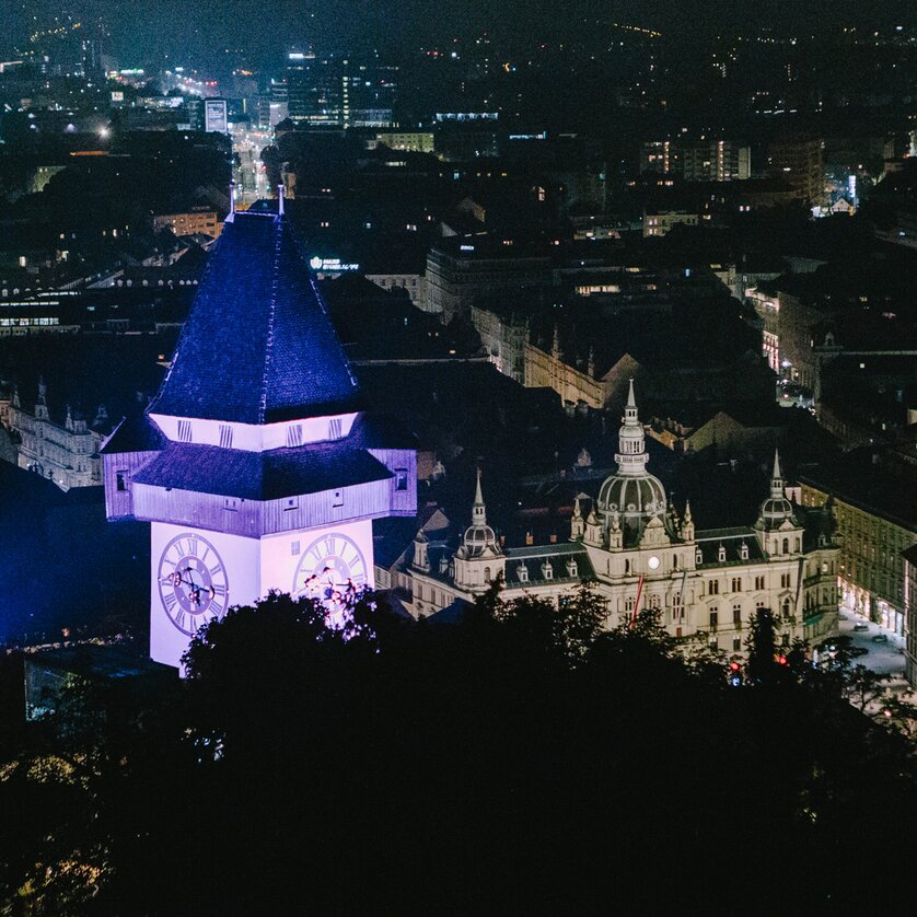 Night View of Graz featuring the Graz Clock Tower | © Sebastian Reiser Illuminated city of Graz at night with the Graz Clock Tower in the foreground. | © Sebastian Reiser