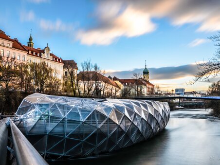 Futuristic design of the Mur island in Graz on the Mur river.