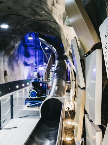 The Slide in Graz features a futuristic slide in a illuminated tunnel. | © Diesel GmbH