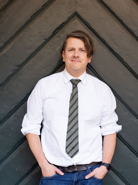 Foto ritratto di Christof Elpons - dipendente del centro informazioni turistiche della regione di Graz | © Graz Tourismus - Werner Krug